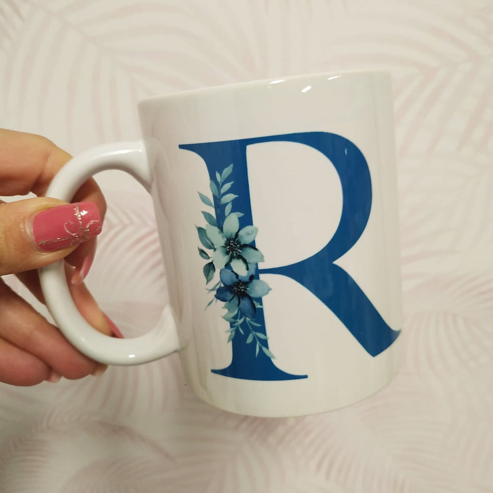 
                      
                        Tazza in Ceramica Lettera
                      
                    